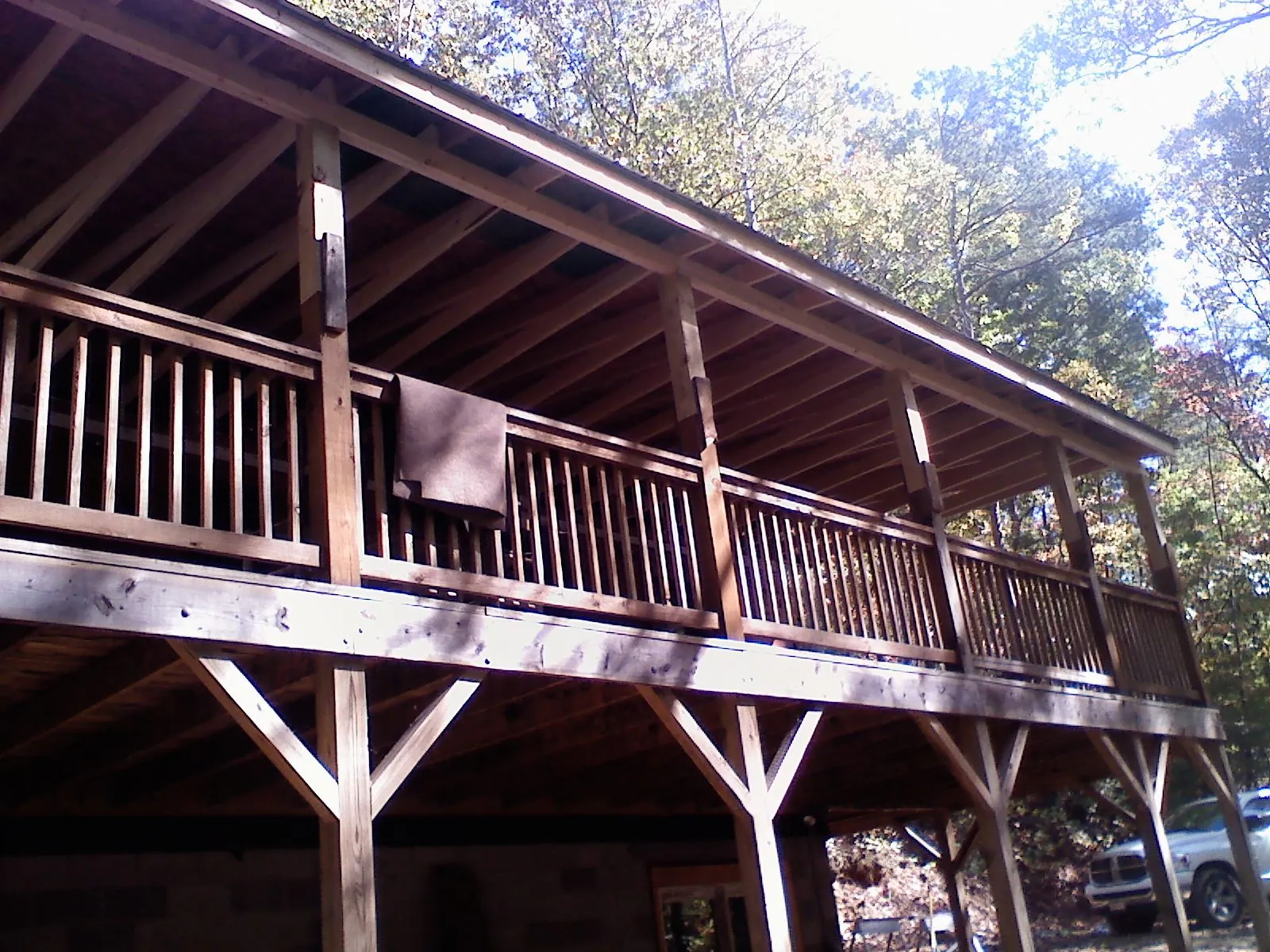 Timber framing under a new elevated porch and deck — Roof Leak Repair in North Bridgton by Roofing Brothers